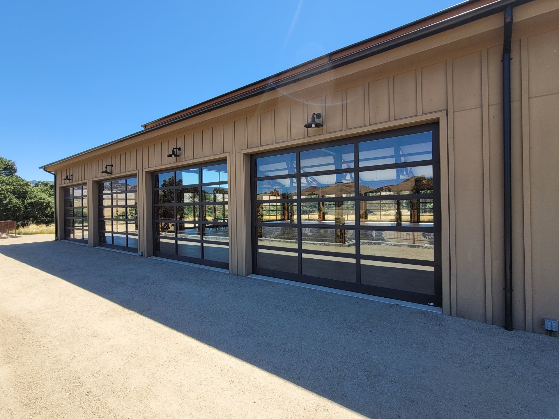 Full-view glass garage doors installed by California Overhead Door in Hollister, CA