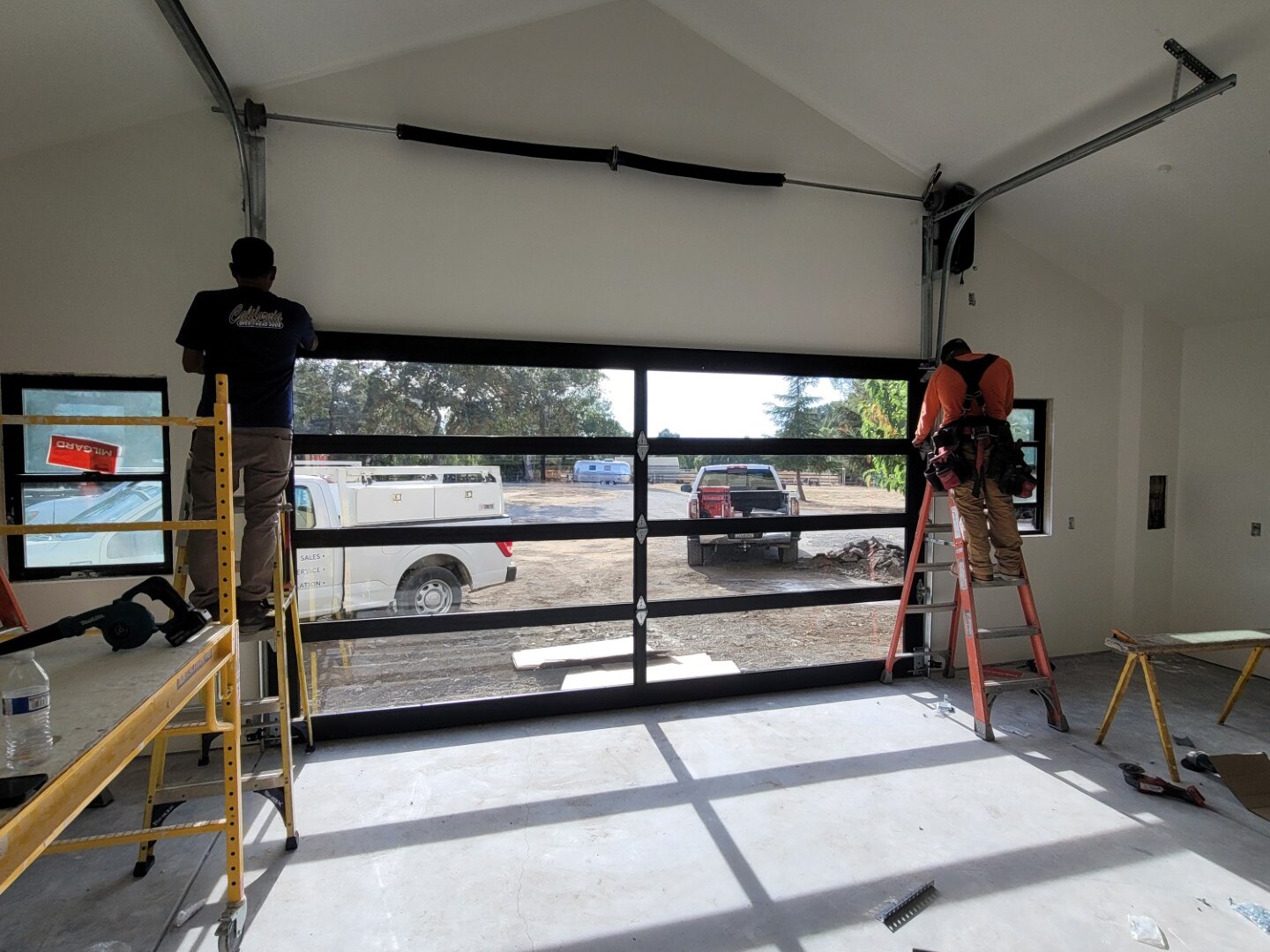 Full-view glass garage door installation