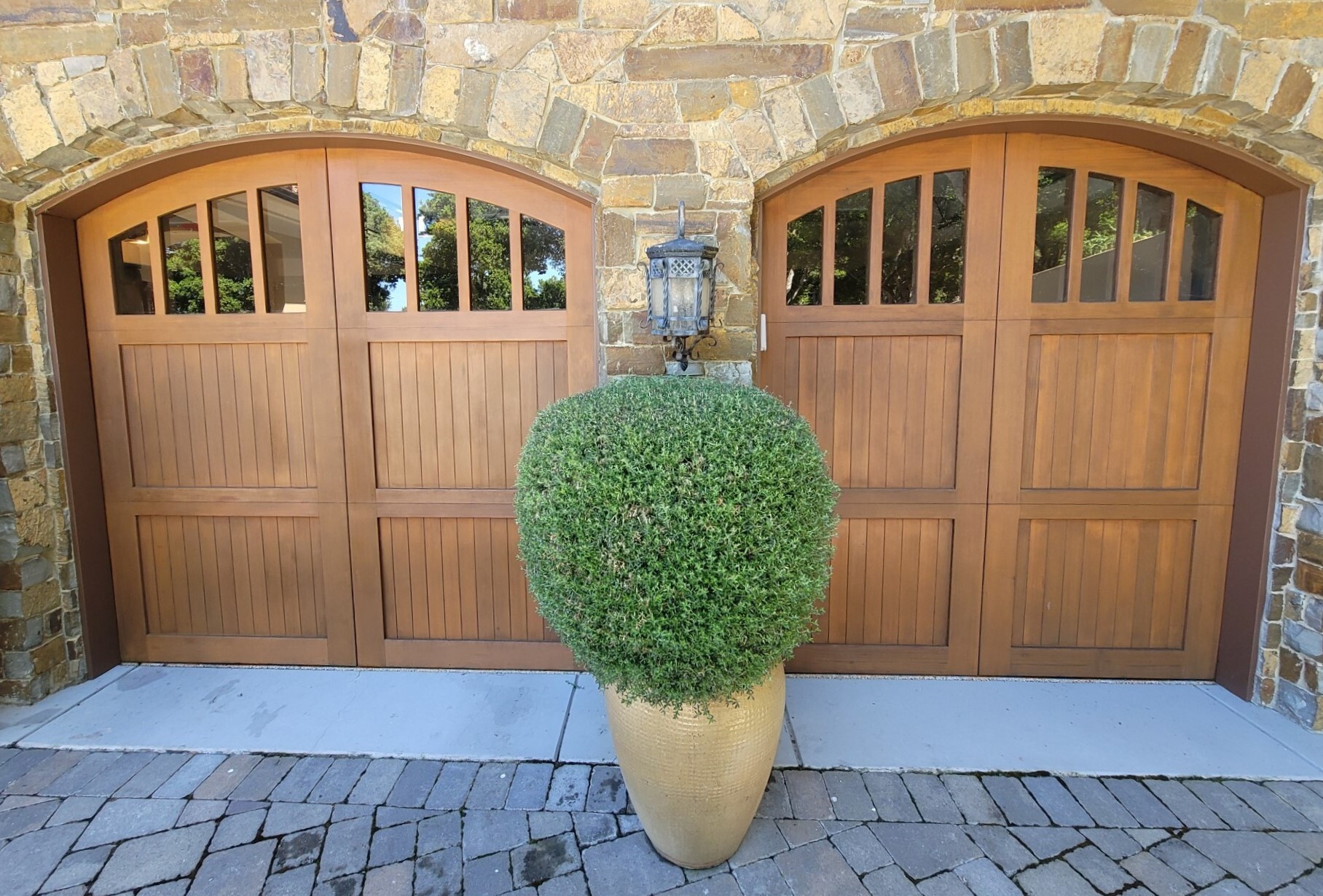 Coastal wood carriage garage doors on a Monterey Peninsula estate